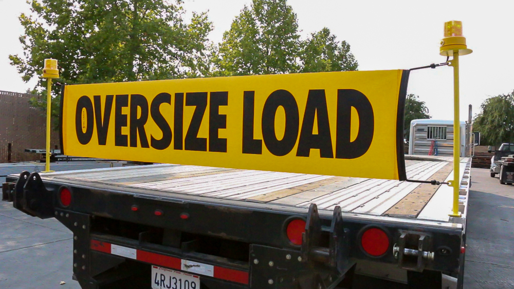 FLATBED TRAILER BANNER MOUNTING SYSTEMS