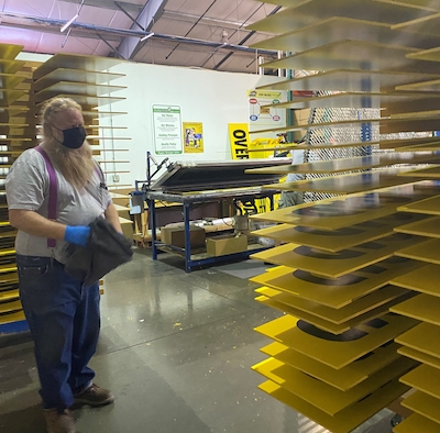 Ms. Carita SafeTruck facility where OVERSIZE LOAD signs are made