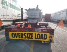 Oversize Load Banner on trailer with large transformer
