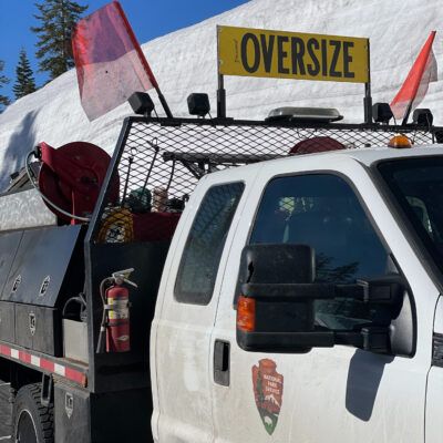 National Park Service Pilot Car with a WIDE LOAD sign and Safety Flags