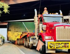 Truck hauling a draw bridge counterweight