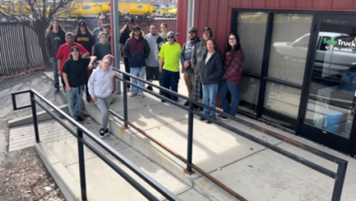 ms. carita safetruck team standing near the doors to the safetruck facility in Verdi, NV