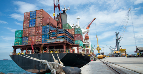 Cargo ship with shipping containers in a port